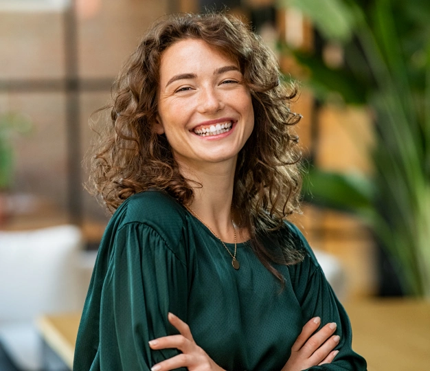 Smiling woman showcasing an attractive healthy smile
