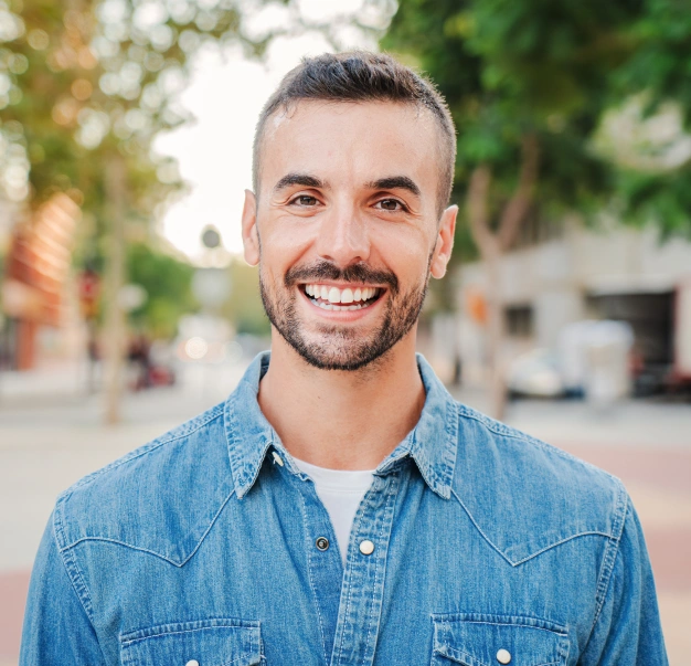 Smiling patient showing bright, healthy teeth